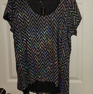 Short sleeve flattering slinky not clingy blouse.